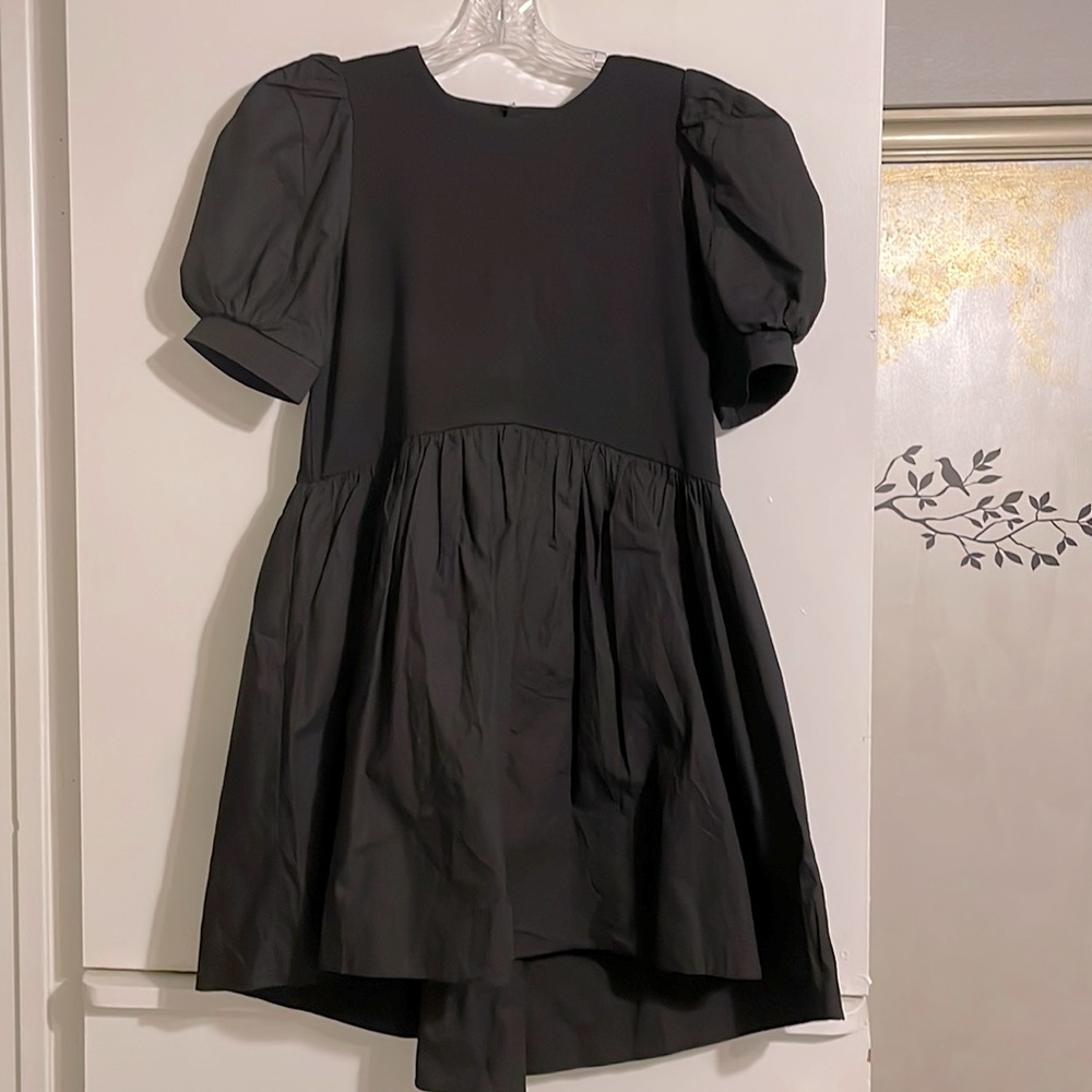 English factory, small, black, high/low dress